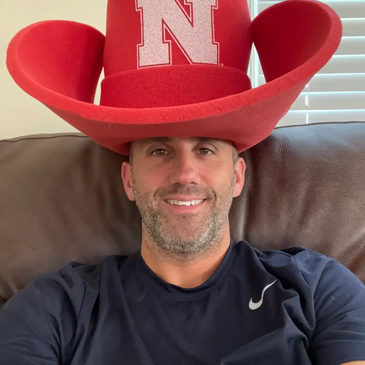 Dr. Johnathon O'Brien wearing a Nebraska hat